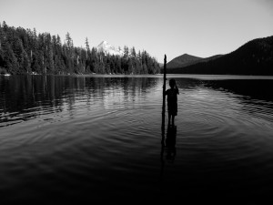 child-silhouette-in-lake